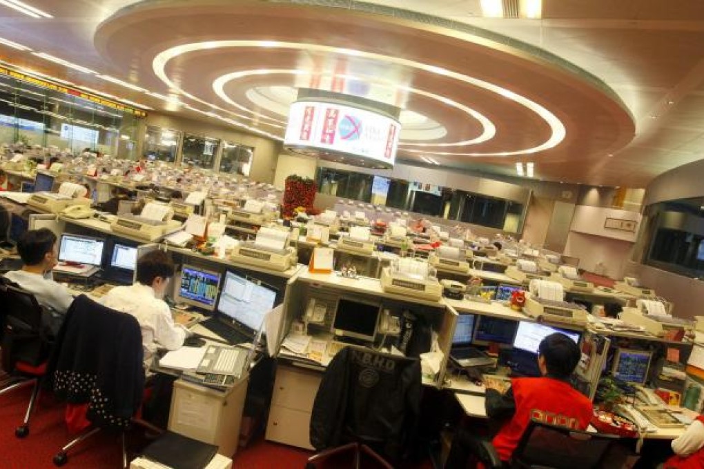 Hong Kong Exchanges and Clearing today adds a new 5pm to 11pm session for trading Hang Seng Index and H-share index futures. Photo: EPA