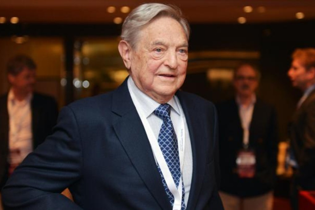 George Soros attends a forum in Hong Kong. Photo: Thomas Yau