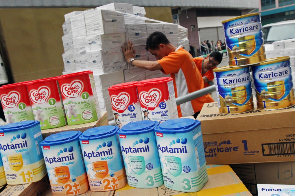 Tins of milk powder found in the warehouse. Photo: David Wong