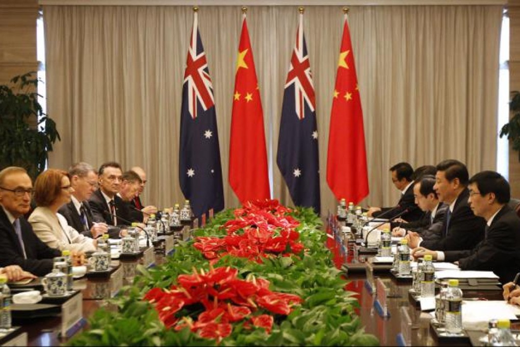 Australia's Prime Minister Julia Gillard (second left) speaks during a meeting with China's President Xi Jinping (second right) on the sidelines of the Boao Forum. Photo: AFP