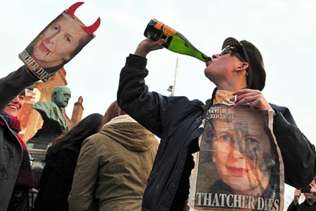 People gather during a 'party' to celebrate the death of former British Prime Minister Margaret Thatcher in London, on Monday. Photo: AFP