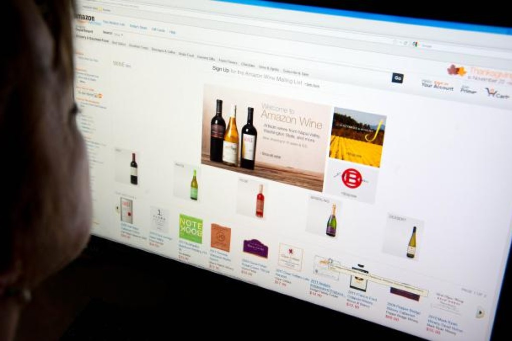 A woman shops for wine on Amazon's Internet site. Photo: AFP
