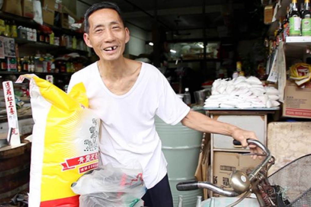 Wong Tak-kam says in the 1970s there were more rice shops in Hong Kong than banks. Photo: SCMP