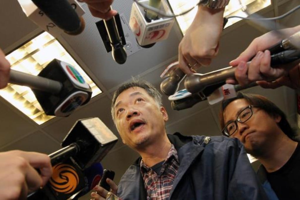 Wong Shiu-cheung, a striking docker and member of the Confederation of Trade Unions, gives his take on yesterday's negotiations. Photo: Felix Wong