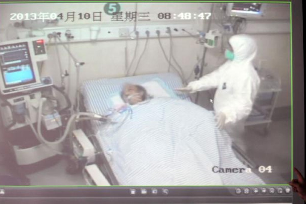 A nurse taking care of an H7N9-contracted patient in Hangzhou, capital of Zhejiang Province. Growing panic over the new strain of bird flu has sparked panic buying of  ban lan gen, a perceived cure. Photo: Xinhua