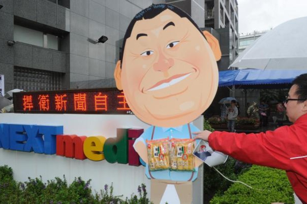 Next Media's Next TV and Sharp Daily operations have eaten into the group's cash flows. Photo: AFP