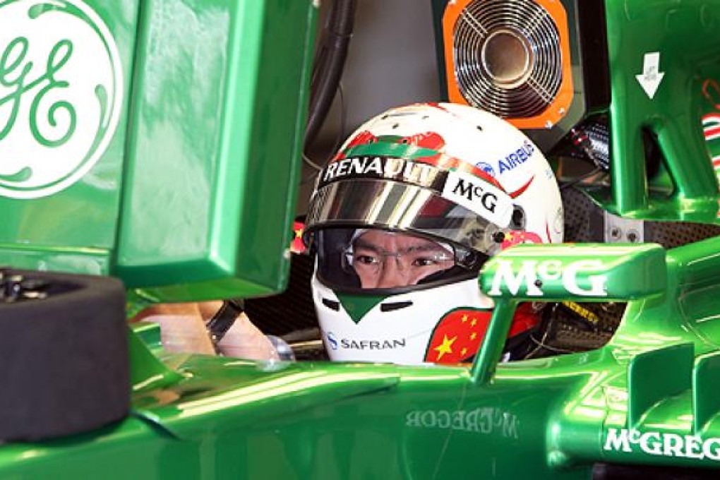 Caterham reserve driver Ma Qinghua drives during the first practice session of the Chinese F1 Grand Prix at the Shanghai International circuit. Photo: Xinhua