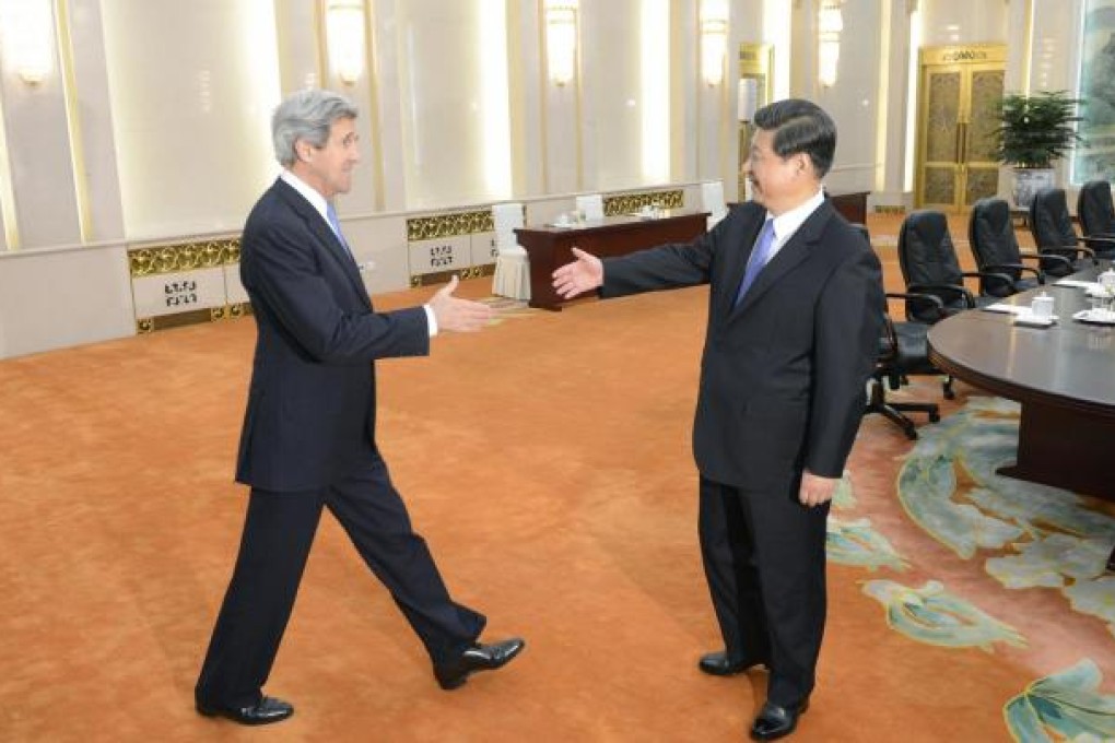 John Kerry meets Xi Jinping in Beijing yesterday. Photo: Reuters
