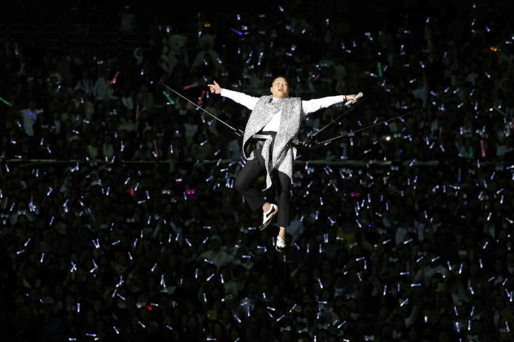 South Korean rapper Psy during his concert 'Happening' at Seoul's World Cup stadium on Saturday, where he performed new song 'Gentleman' in public for the first time. Photo: Reuters