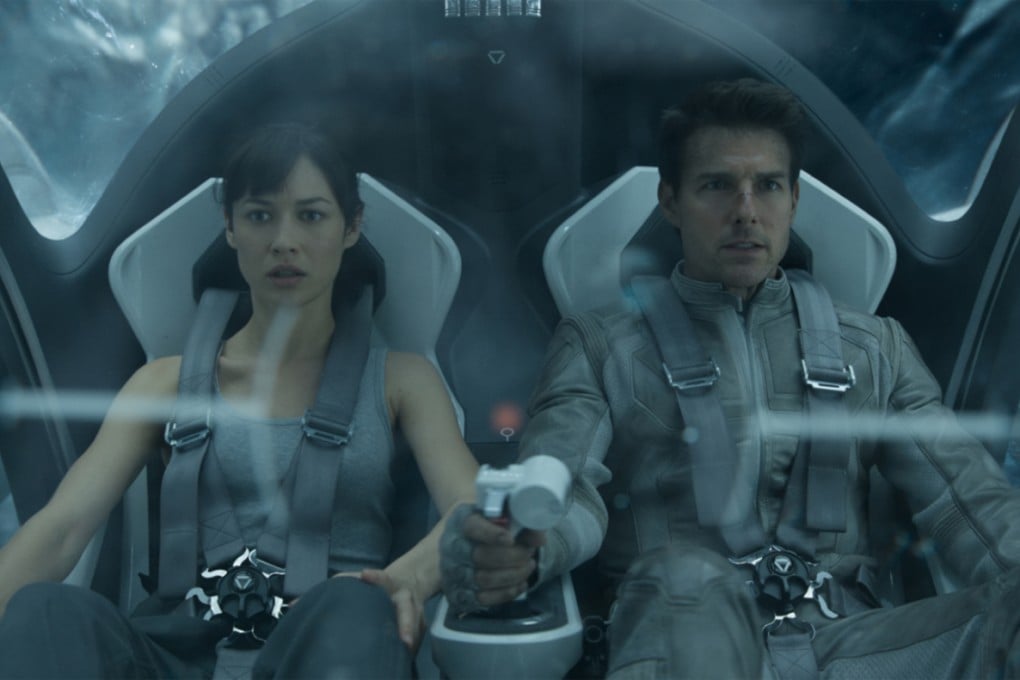 Joseph Kosinski's Oblivion stars Tom Cruise (right), Olga Kurylenko (left), Morgan Freeman and Andrea Riseborough.