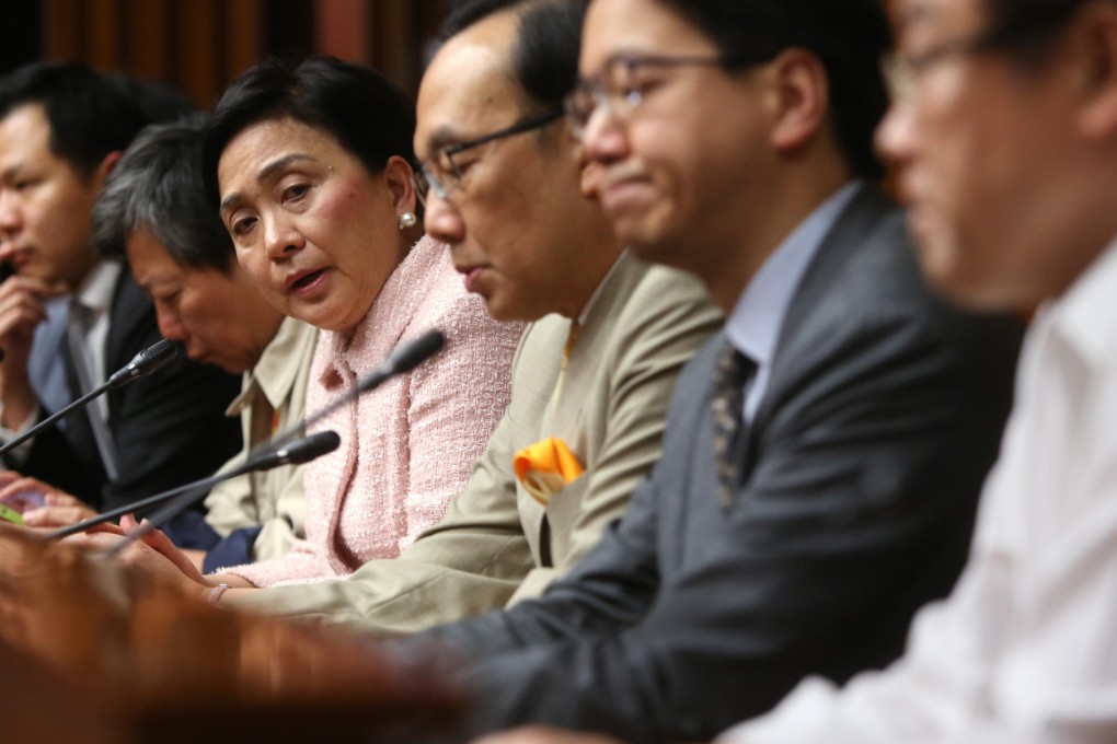Pan-democrats Dennis Kwok Wing-hang, Lee Cheuk-yan, Emily Lau, Alan Leong, Charles Mok Nai-kwong and Frederick Fung Kin-kee announce they are withdrawing their amendments. Photo: Sam Tsang