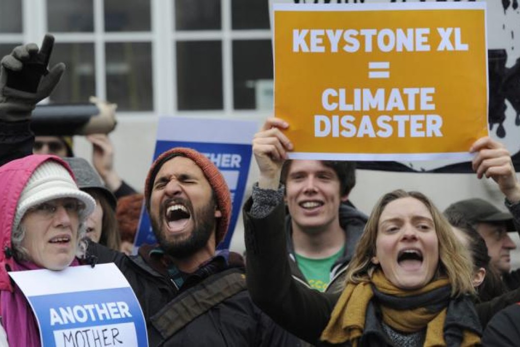 Environmental campaigners voice their opposition to the Keystone XL tar sands pipeline. Photo: EPA