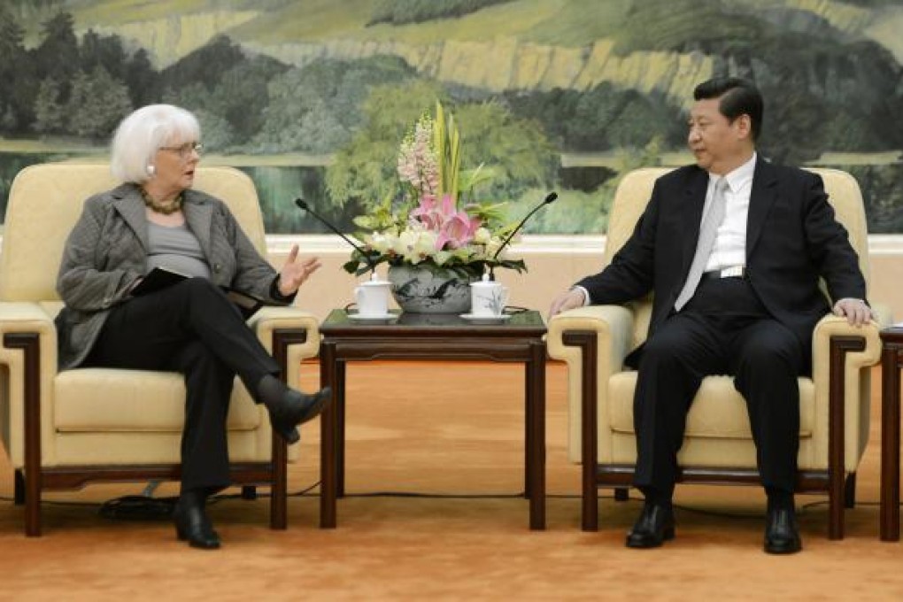 Johanna Sigurdardottir with Xi Jinping yesterday. Photo: AP