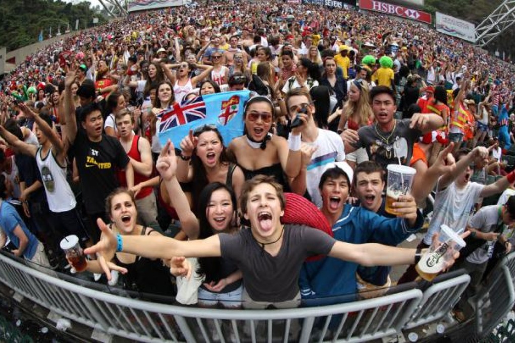 Fans from all over the world react during the final day of the Hong Kong Rugby Sevens tournament. Photo: AFP