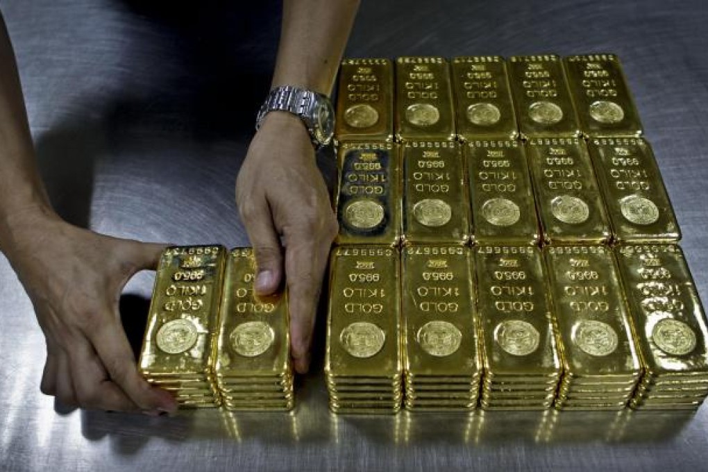 Gold has had a 12-year bull run but price falls this week could give central bankers more reason to keep pump-priming. Photo: AP