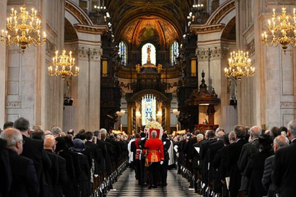 Military personnel carry the coffin of former British prime minister Thatcher into St Paul's Cathedral for her funeral service, in London. Photo: Reuters