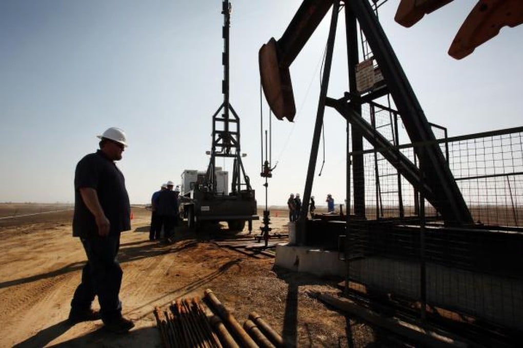 Men work the oilfields in California. US crude oil production will soon surpass oil imports. Photo: MCT