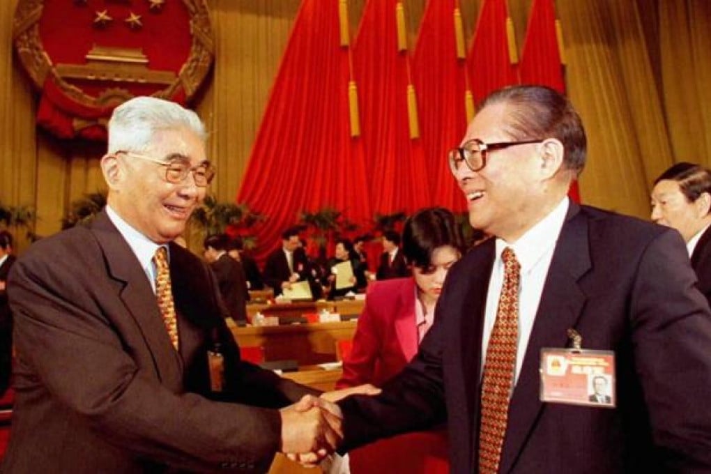 Rong Yiren (left) congratulates Jiang Zemin at the National People's Congress in Beijing in 1998; Jiang was re-elected as president during the session while Rong was replaced as vice-president by Hu Jintao. Photos: AP; SCMP