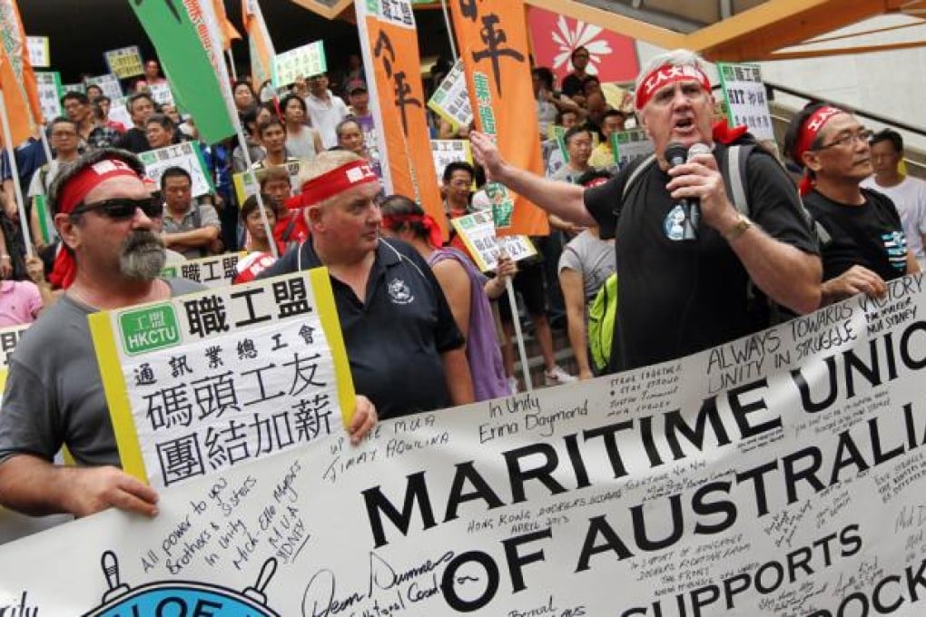 Australian unionists join local strikers in a march from the Kwai Tsing port to the Labour Department''s office in Kwai Chung. Photo: K. Y. Cheng