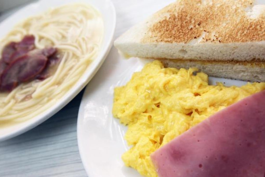 The afternoon combo of eggs, toast and ham is served with spaghetti and char siu. Photos: May Tse