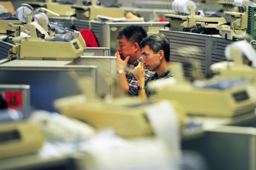 Turnover on the exchange was a thin HK$66 billion yesterday, indicating that buying appetite continues to be weak. Photo: AFP