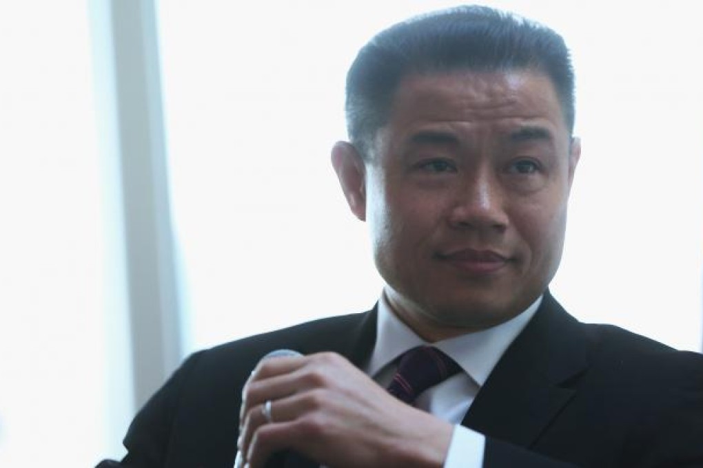 New York City Comptroller and mayoral candidate John Liu speaks at a political forum. Photo: AFP