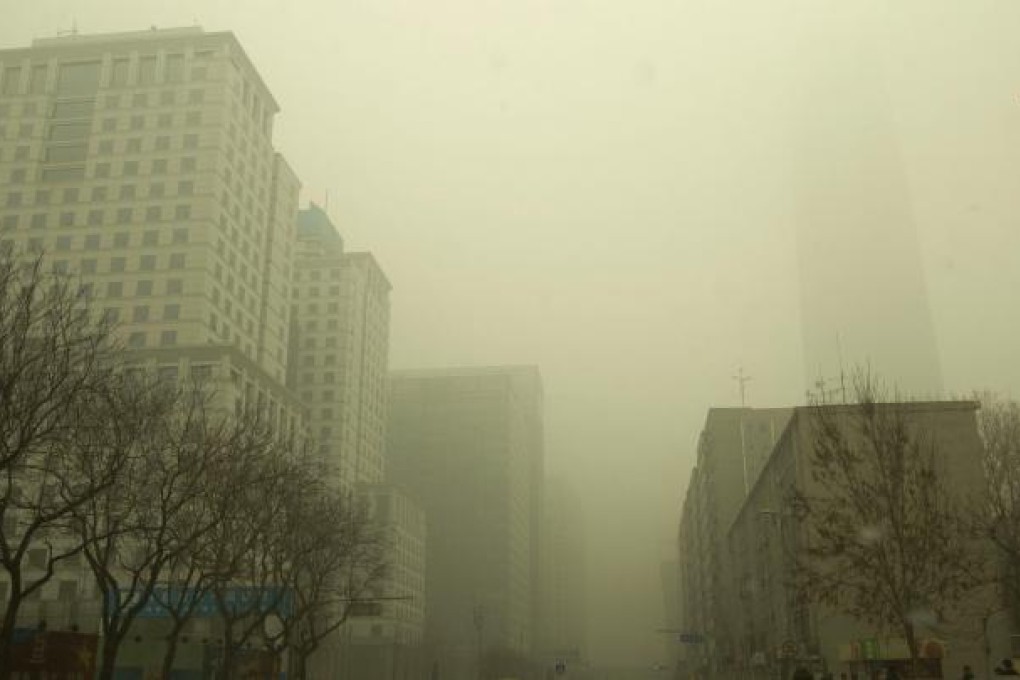 Smog is an all too familiar sight in Beijing. Photo: Simon Song