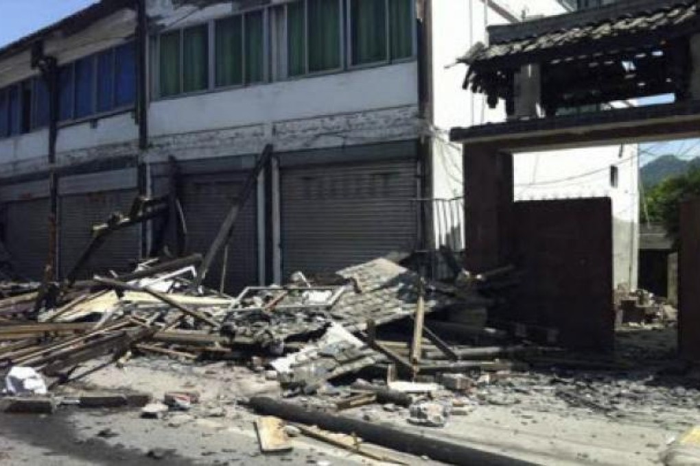 Collapsed houses are seen after a 6.6 magnitude earthquake in Lushan county, Ya'an, Sichuan province, on Saturday. Photo: Reuters