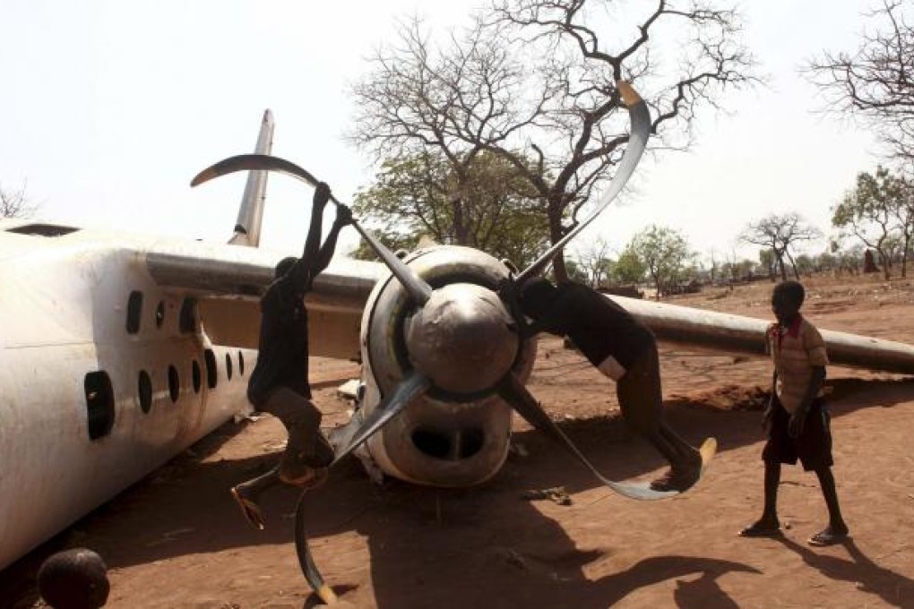 Refugee children play on an old plane that crashed at the Yida camp in South Sudan. Most of the world's extreme poverty cases are concentrated in Africa. Photo: Reuters