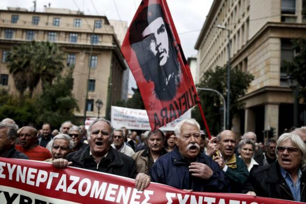 Pensioners march in an anti-austerity rally in Athens, Greece. Photo: Reuters