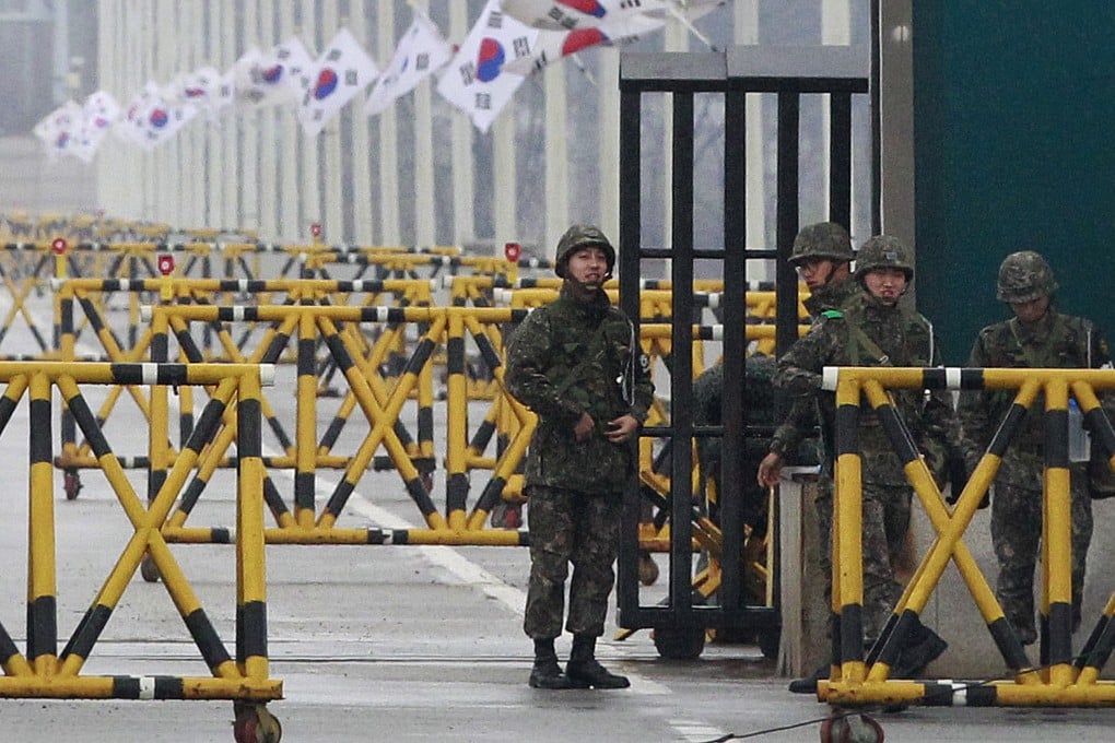 South Korean army soldiers stand guard at Unification Bridge in Paju, South Korea, near the border village of Panmunjom. Photo: AP