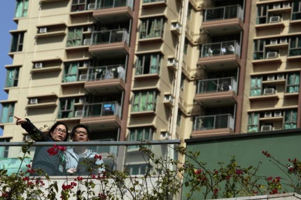 Research company Sanford C. Bernstein forecasts that cooling efforts will take as much as a quarter off home prices. Photo: Reuters