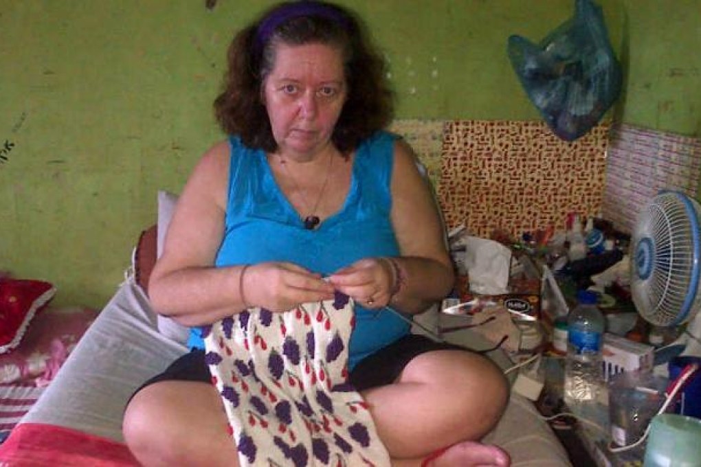 Lindsay Sandiford knits in her cell on death row in Bali