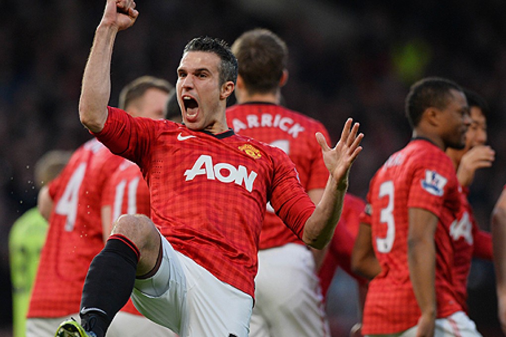 Manchester United's Robin van Persie celebrates scoring his team's first goal against Aston Villa. Photo: AFP