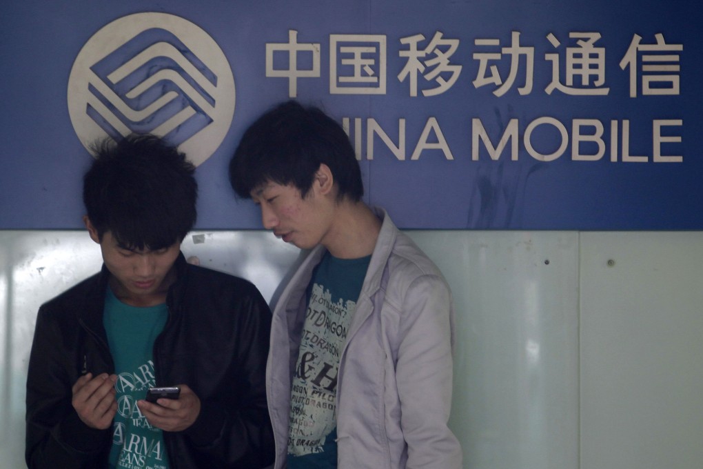 China Mobile complains that Tencent's popular WeChat mobile instant messaging service is hogging up capacity on its network. Photo: Reuters