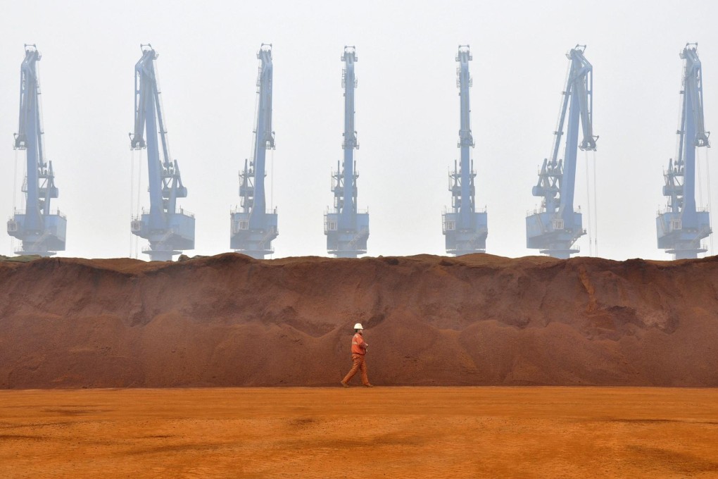 Iron ore from Australia amasses at a port in Tianjin, where prices of some grades of the commodity have fallen since hitting highs in February. Photo: Reuters