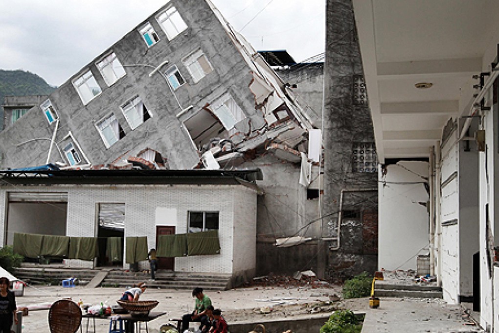 A collapsed residential building in Lingguan townshiop, Baoxing county. Photo: Simon Song