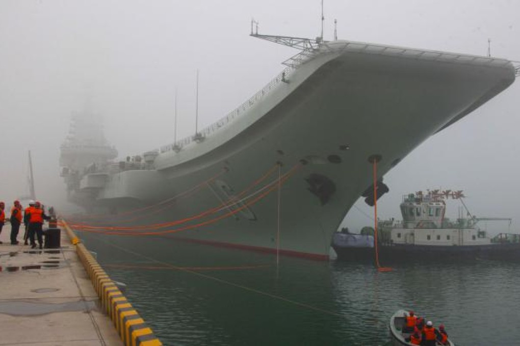 The Liaoning moored at its home port of Qingdao. Photo: Xinhua