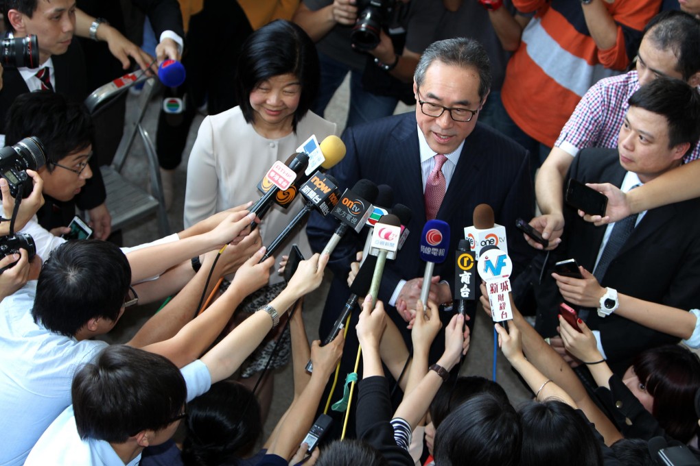 Lisa Kuo and Henry Tang face the media. Photo: Felix Wong