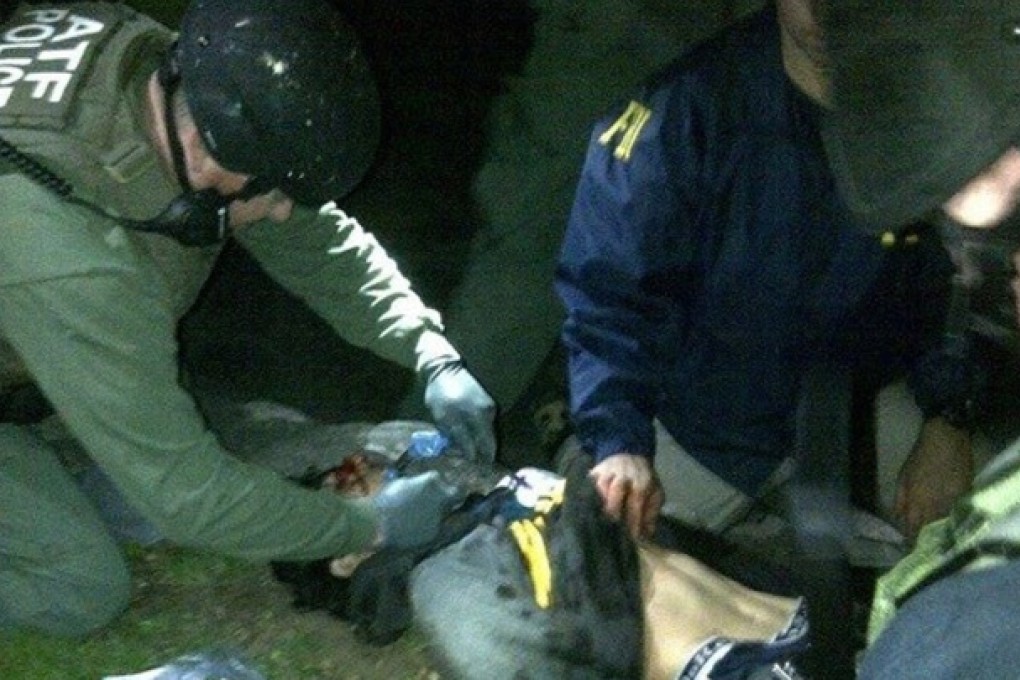 Boston Marathon bombing suspect Dzhokhar Tsarnaev is apprehended by police. Photo: AP