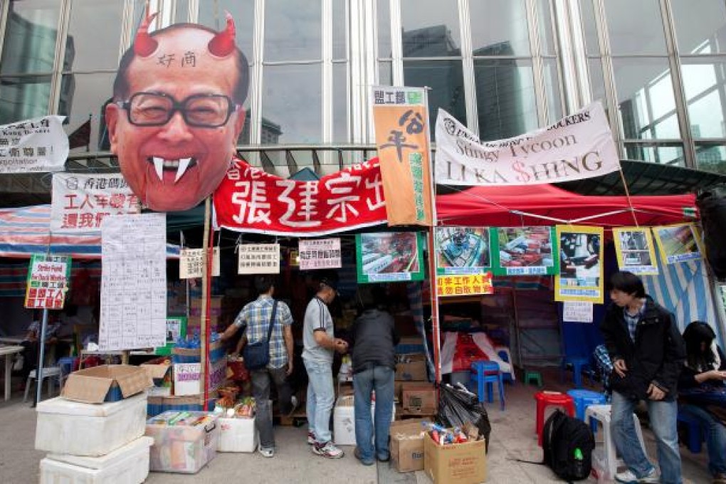 The face of businessman Li Ka-shing doctored by dockers.