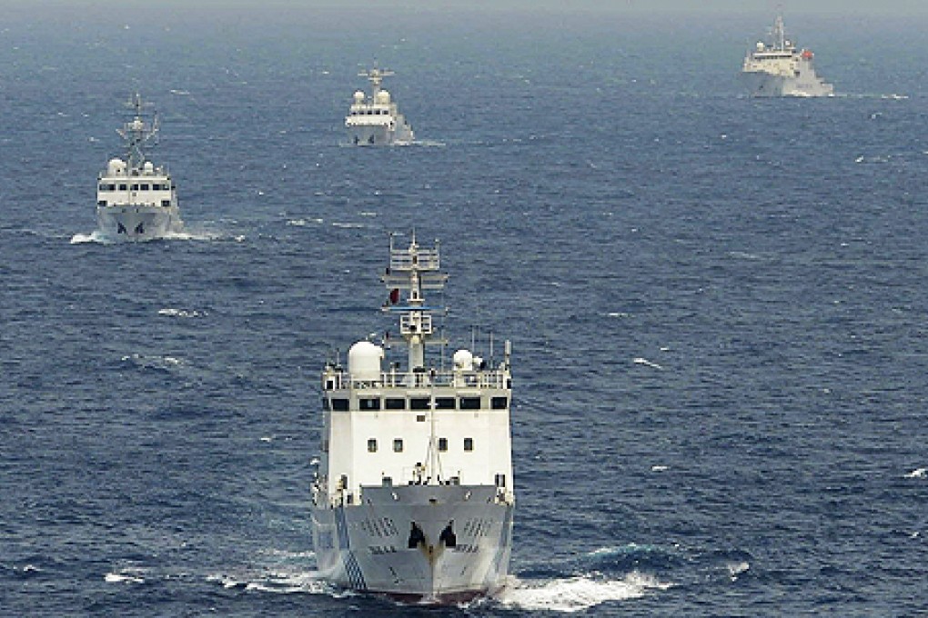 Chinese surveillance ships sail in formation in disputed waters near Diaoyu Islands on Tuesday. Photo: AP