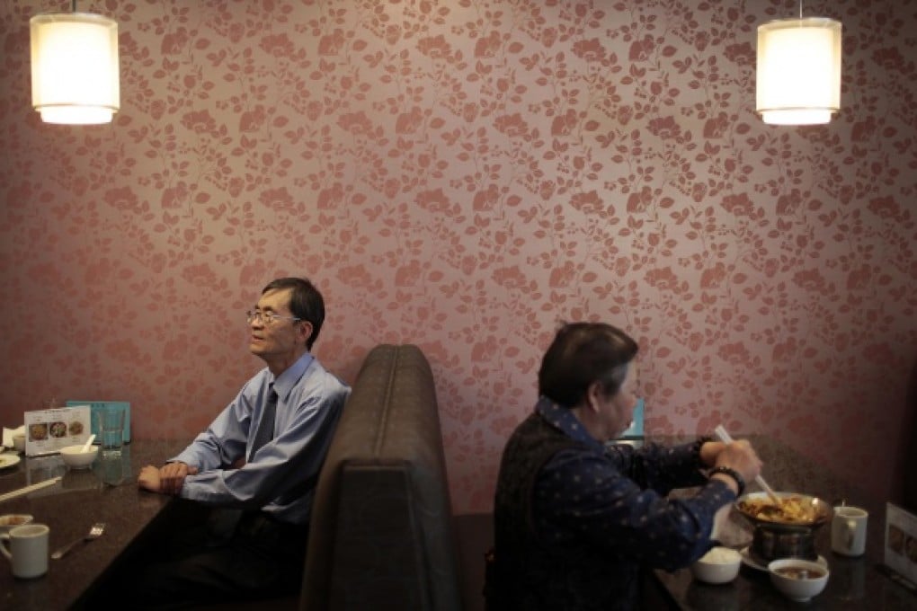 Chinese food expert David Chan, left, dines at a restaurant in Arcadia, Los Angeles county. Photo: MCT
