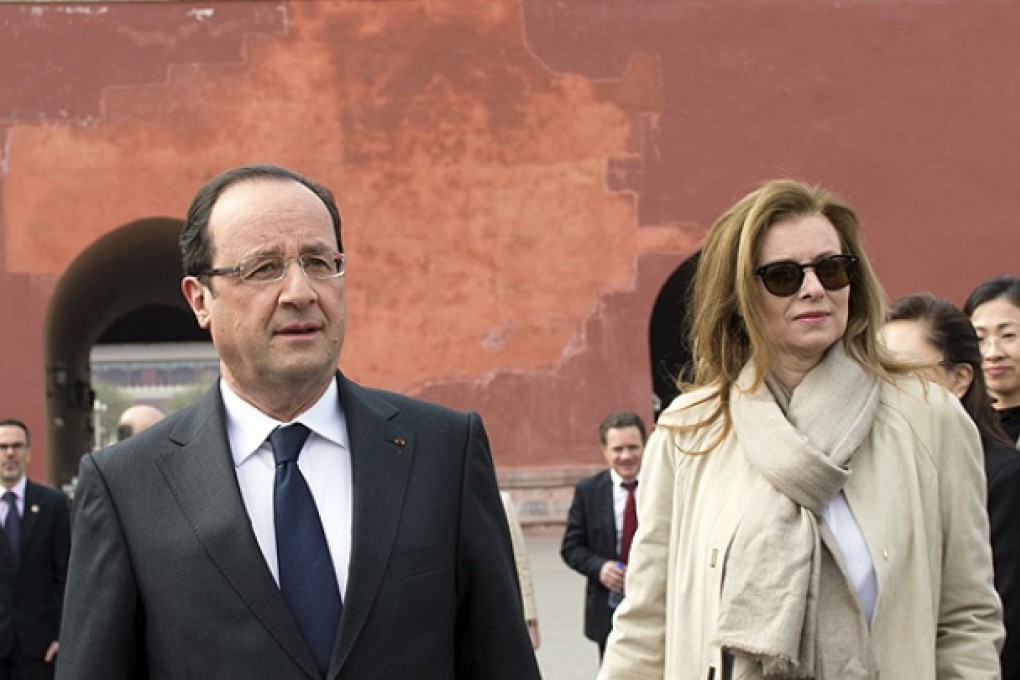 Francois Hollande and Valerie Trierweiler visit the Forbidden City in Beijing. Photo: AP
