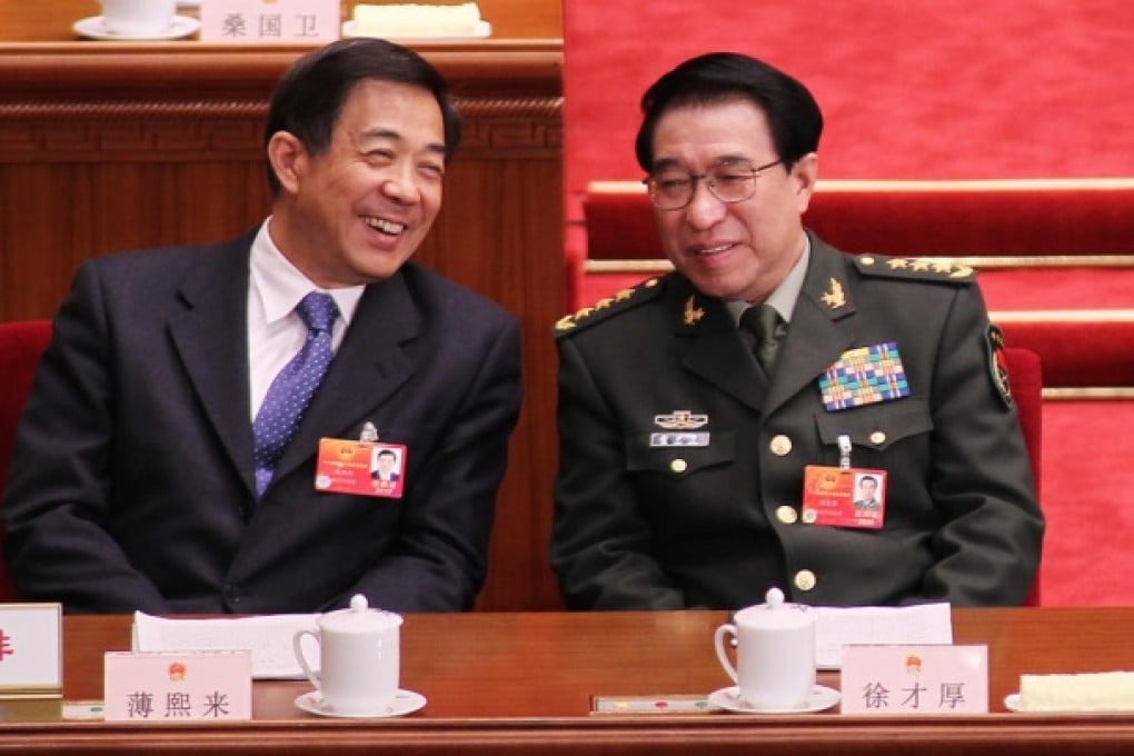 Bo Xilai and Xu Caihou at last year's National People's Congress. Photo: SCMP