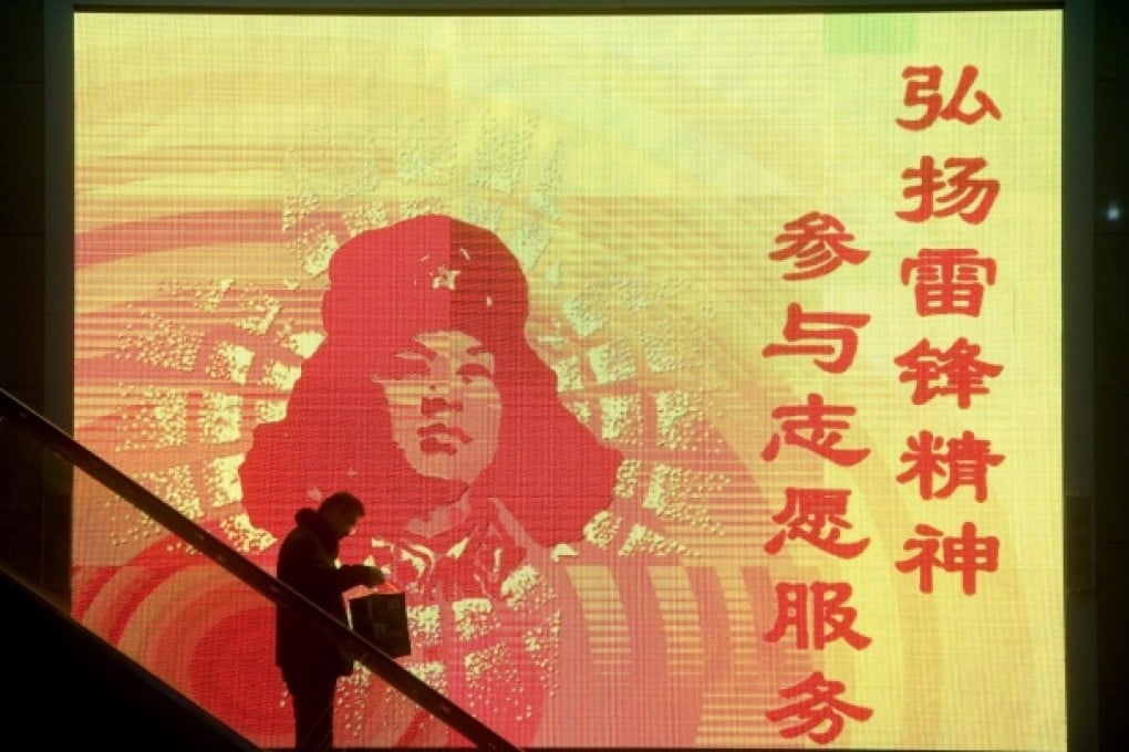 Humble soldier Lei Feng became a household name and China's symbol of sacrifice for others after his death in 1962. Photo: EPA