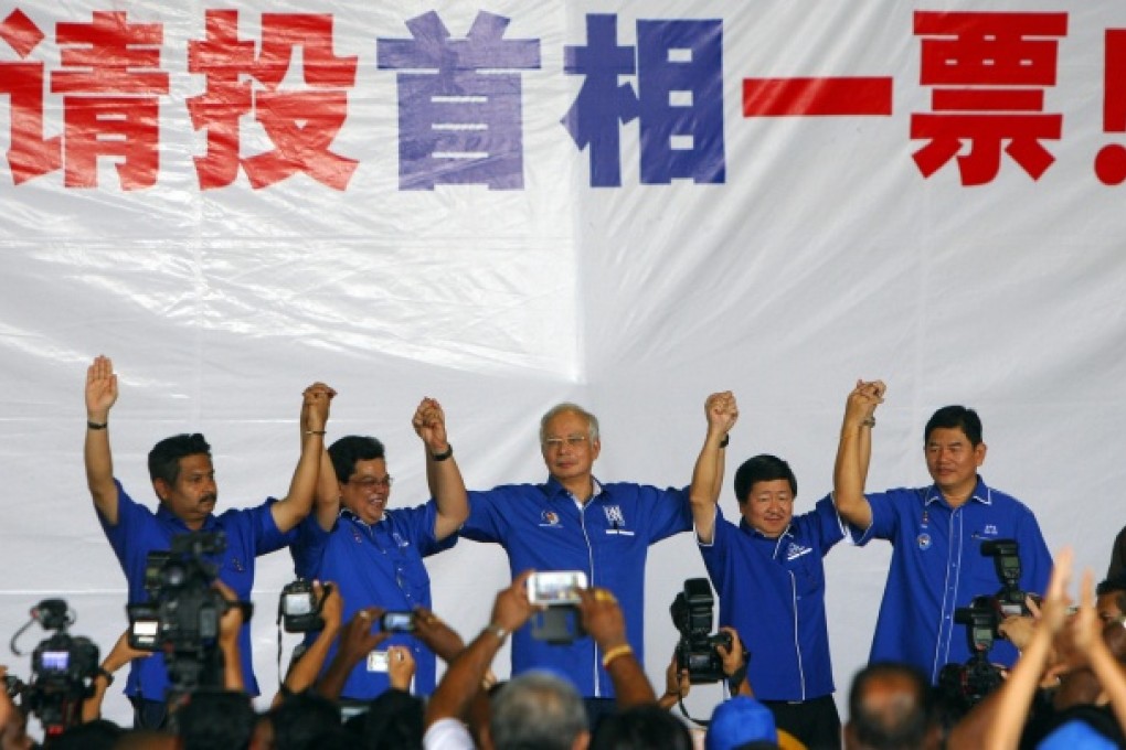Najib Razak, centre, faces an electorate divided along ethnic lines and needs to win an overwhelming share of the Malay vote. Photo: AP