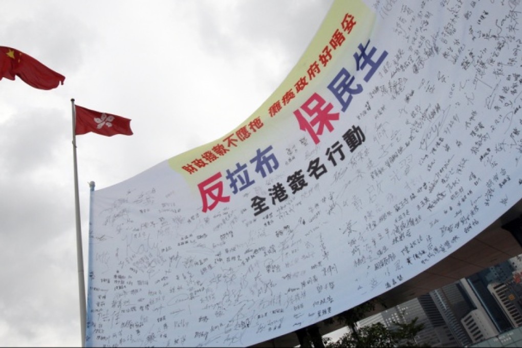 DAB stages an anti-filibuster demonstration outside Legislative Council. Photo: David Wong