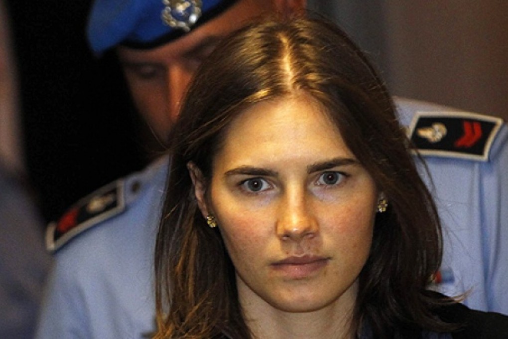 Amanda Knox leaves court for a break during her appeal trial session in Perugia in 2011. Photo: Reuters