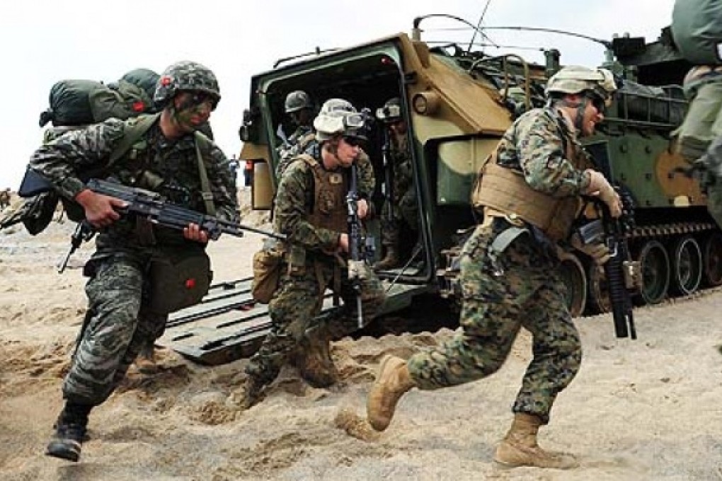 US and South Korean Marines participate in a joint amphibious landing operation exercise during the 'Foal Eagle' series of joint and combined field training manoeuvers. Photo: EPA